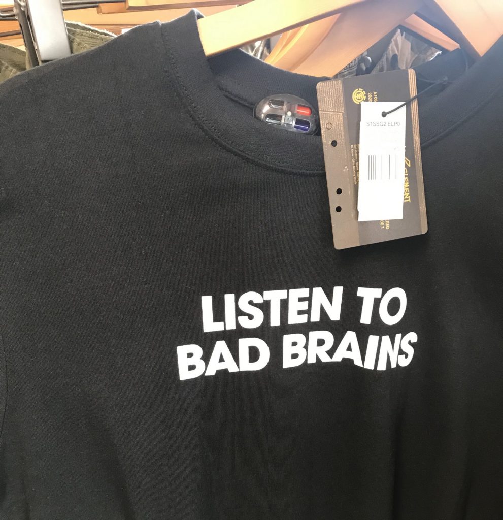 Shirt with "listen to Bad Brains" written on it