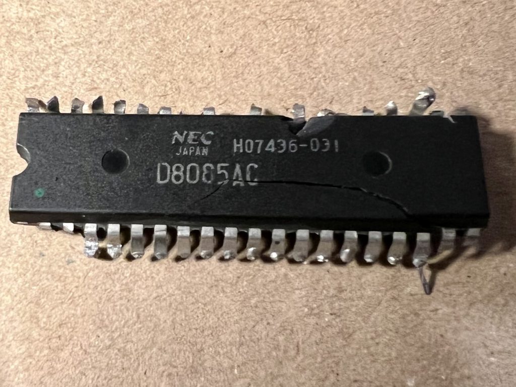 Image of The broken and cut 8085 chip